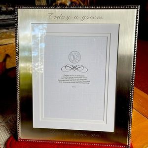 Silver picture frame. Engraving is beautiful. See date. Never out of box